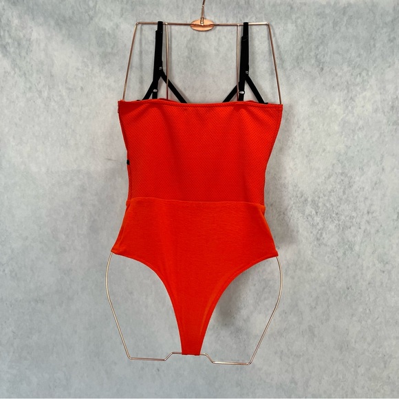 Vibrant Orange & black body suit top w/ geomagnetic black line detail - Picture 5 of 10